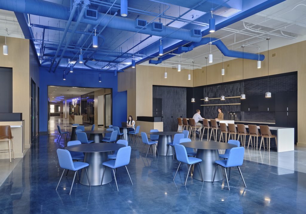 A Geyser of Light | The third-floor café and kitchenette overlooks Fountain Square and features pendant cylinders and cove lighting that activates the painted ceiling as well as the mechanical, electrical and plumbing equipment