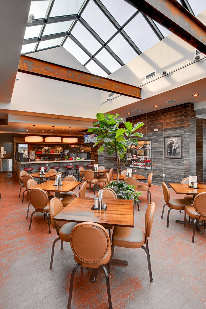 Rethinking the Glass Box | Monroe’s Restaurant uses architectural metal-framed glass skylights to improve color fidelity and create a more welcoming environment for building occupants