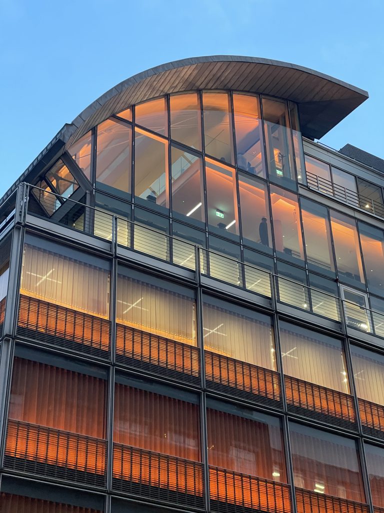 The Warm Glow In Soho | Hospitality areas on the top two floors feature a built-in linear lighting system, balancing the building’s aesthetic