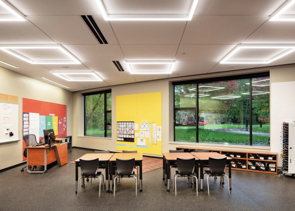 Speaking Native Architectural Language 2 Updated classroom lighting provides a solution that aligns with the project’s architecture.