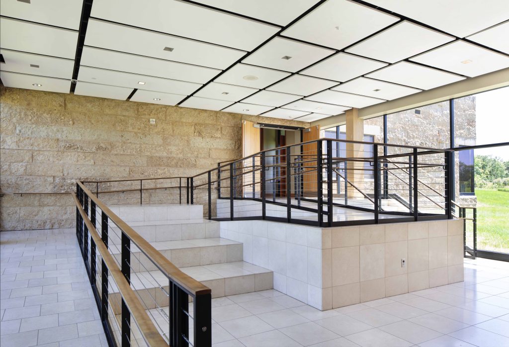 Speaking Native Architectural Language 5 Illumination at the puzzle stairs transitions from one academic wing to another.