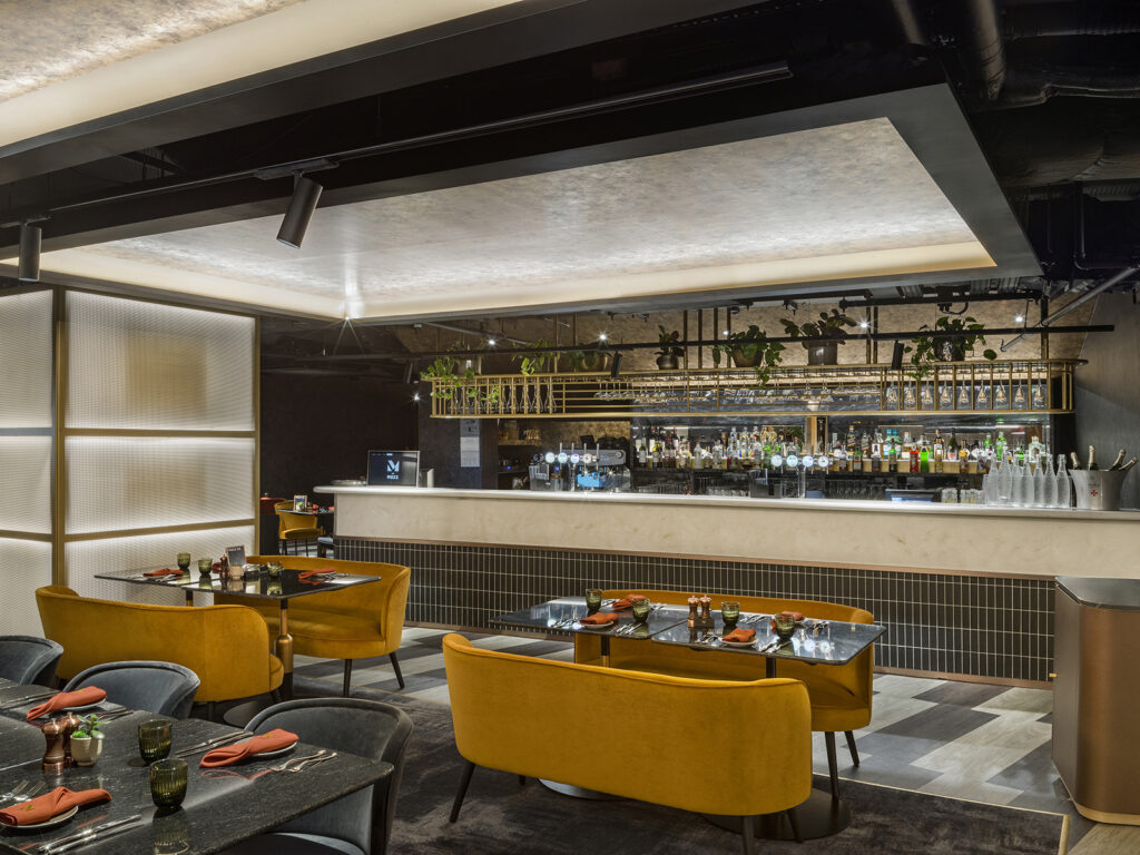 Project In Pictures: Pump Up the Jam | Subtle illumination creates a flowing harmony between the venue floor and The Mezz.