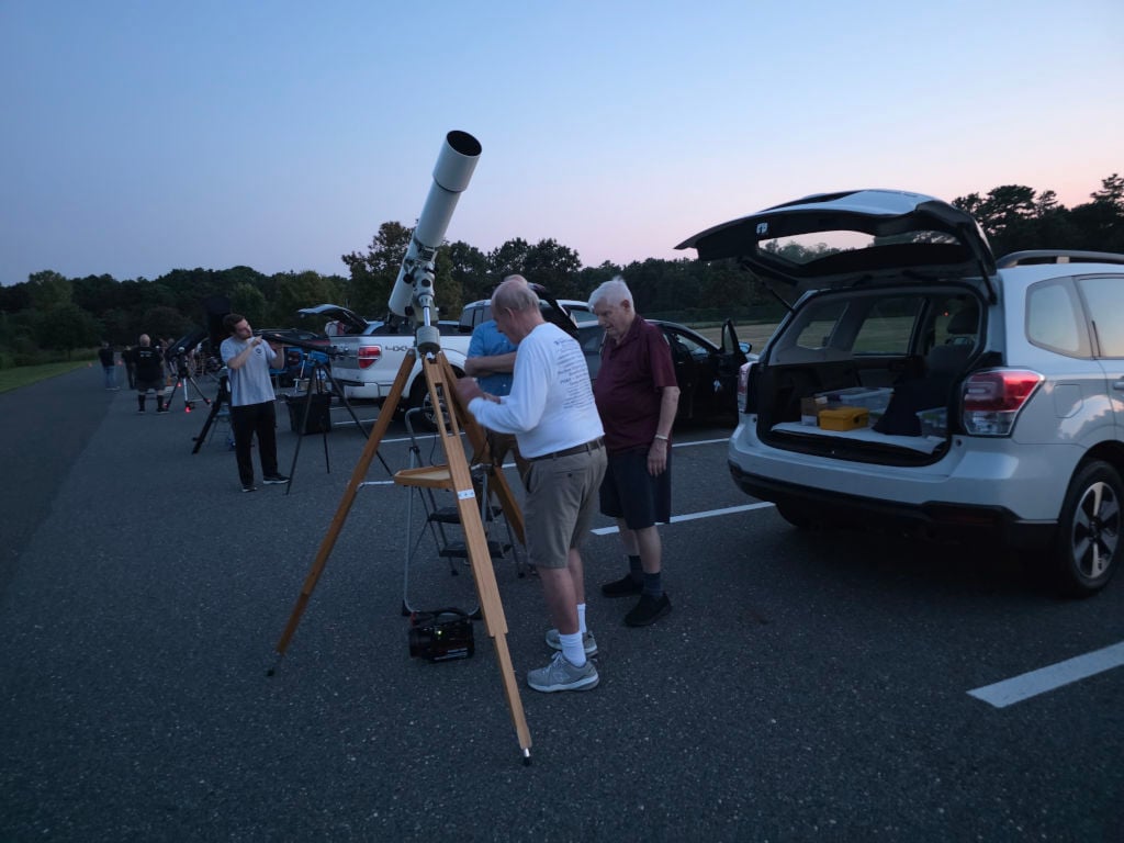 Participants set up telescopes during a recent Star Party event at Jakes Branch County Park. | Photo: James Webster.