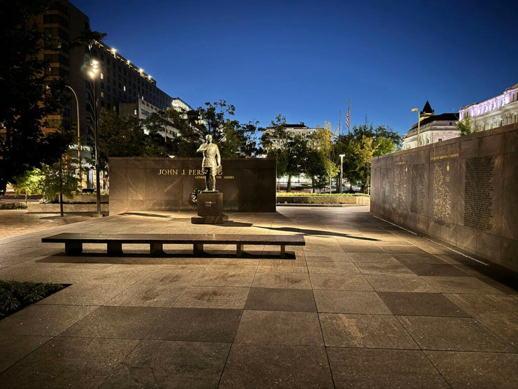 A Journey of Remembrance 2 A Journey of Remembrance By David Shiller | The statue of General Pershing is accentuated with narrow beam fixtures located on plaza poles. Linear uplights highlight inscriptions on flanking walls. Photo: Fisher Marantz Stone
