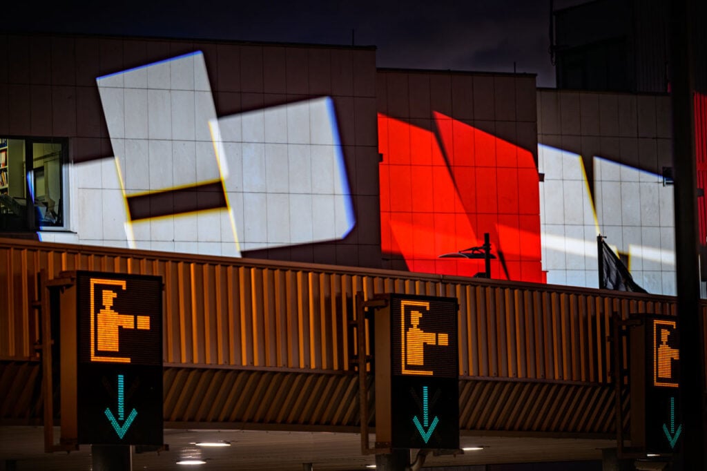 The Only Way Is Through 2 The Only Way Is Through | The Učka Tunnel in Croatia unites steel, stone, and sea | An abstract red-and-white projection scene connects to the Croatian checkerboard flag. Photo by Danijel Bartolic