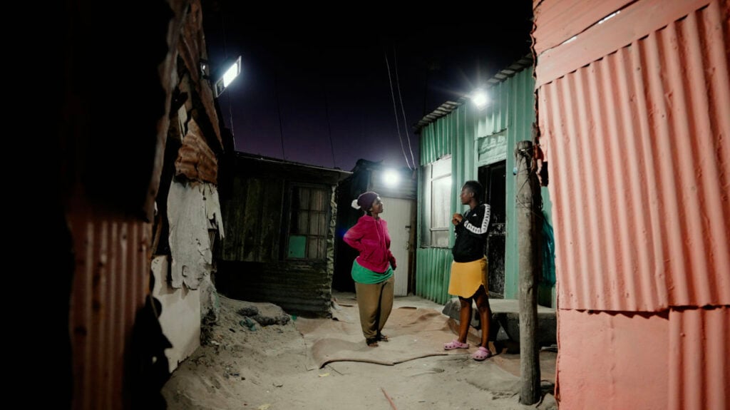 From Darkness to Dignity | Empowering African refugee communities and informal settlements | The Layita Khayelitsha campaign by InDrive, in collaboration with LightUp and the local community, allows residents to enjoy their newly lit neighborhood. Photo: InDrive