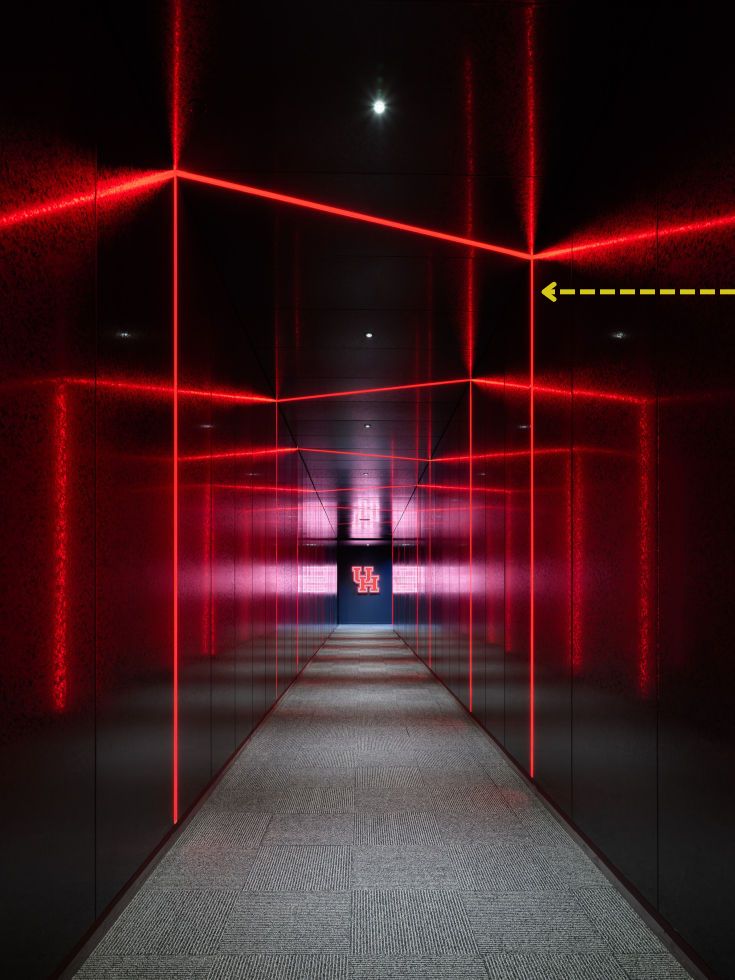 Project in Pictures: Entering Cougar Territory | Red “portals” transform a corridor into a “hype tunnel” to amplify players’ adrenaline before they step onto the gridiron.
